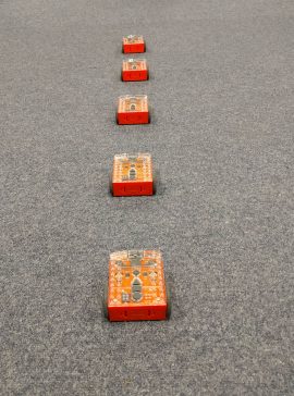 Edison robots set up for dominos